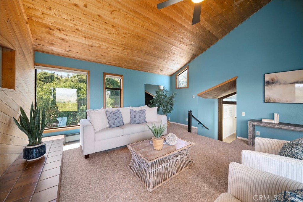 1606 Valley View Drive Los Osos, CA 93402 - Photo 30 of 50 a living room with furniture potted plant and a large window