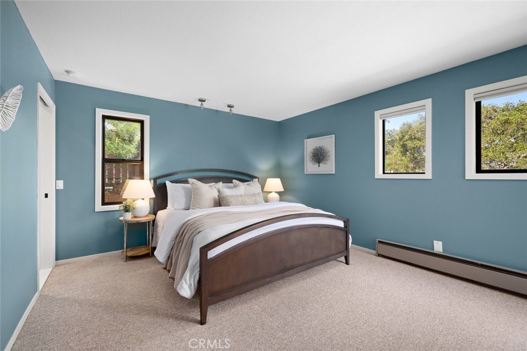 1606 Valley View Drive Los Osos, CA 93402 - Photo 31 of 50 a bed room with double bed and a window