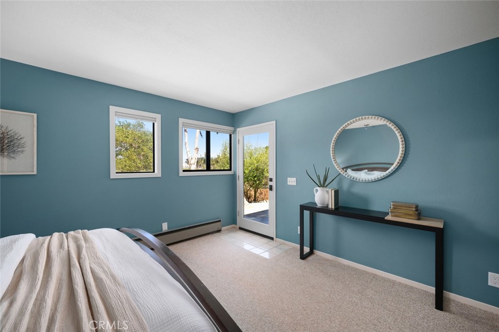 1606 Valley View Drive Los Osos, CA 93402 - Photo 32 of 50 a bedroom with a bed and a dresser