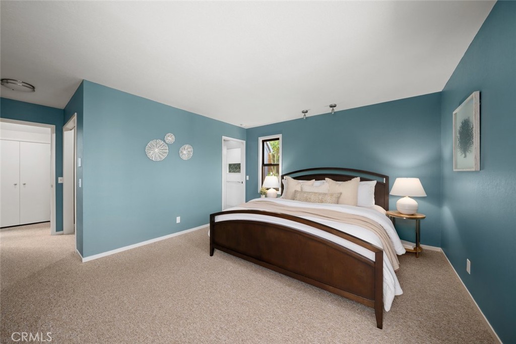 1606 Valley View Drive Los Osos, CA 93402 - Photo 33 of 50 a bedroom with a bed and window