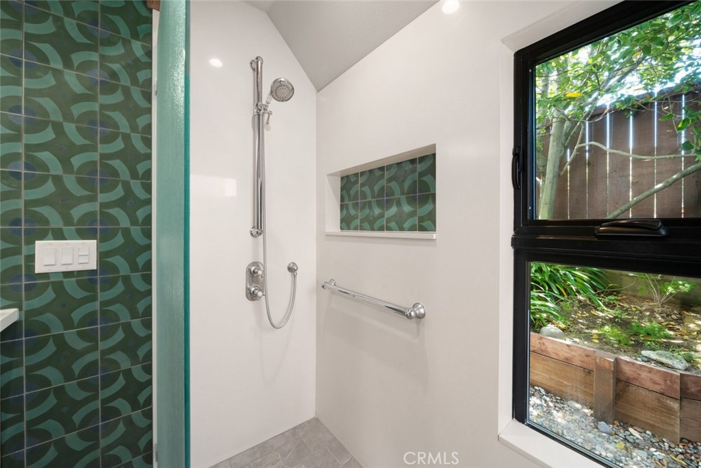 1606 Valley View Drive Los Osos, CA 93402 - Photo 36 of 50 a bathroom with a glass shower door