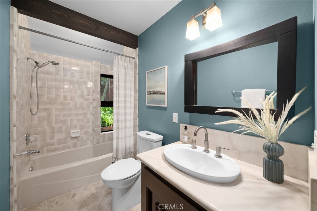 1606 Valley View Drive Los Osos, CA 93402 - Photo 40 of 50 a bathroom with a sink a toilet and shower