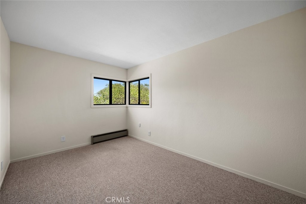 1606 Valley View Drive Los Osos, CA 93402 - Photo 41 of 50 an empty room with windows