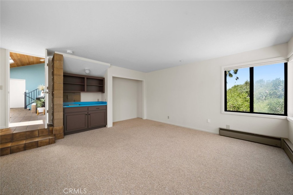 1606 Valley View Drive Los Osos, CA 93402 - Photo 45 of 50 a view of an empty room with a window and kitchen view