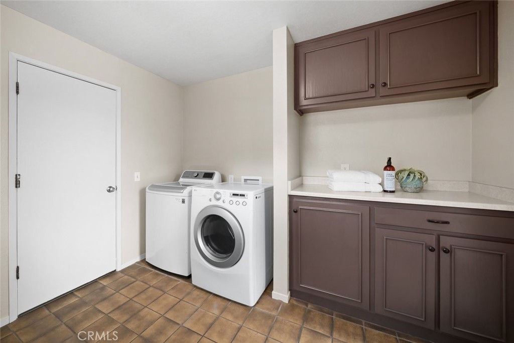 1606 Valley View Drive Los Osos, CA 93402 - Photo 47 of 50 a utility room with sink dryer and washer