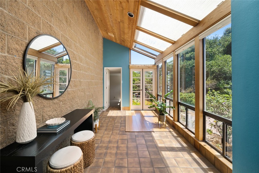 1606 Valley View Drive Los Osos, CA 93402 - Photo 6 of 50 a bathroom with a toilet mirror and a large window
