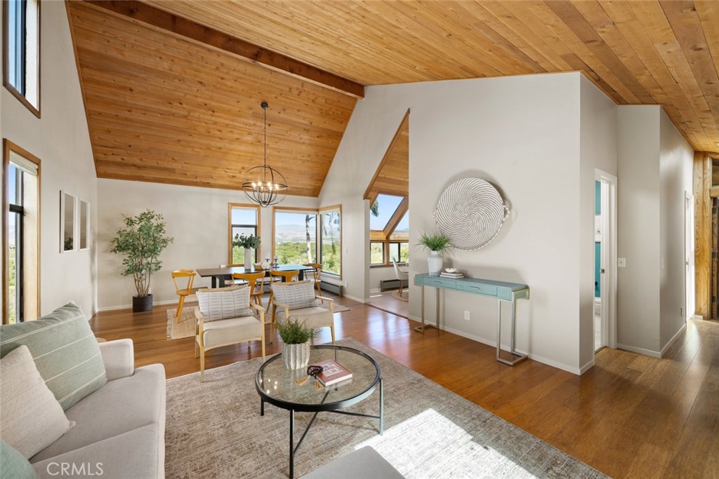 1606 Valley View Drive Los Osos, CA 93402 - Photo 10 of 50 a living room with furniture a rug and a large window