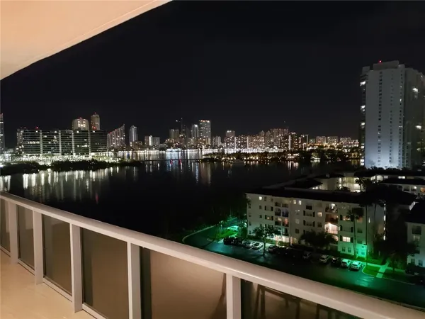 a view of a lake with a city