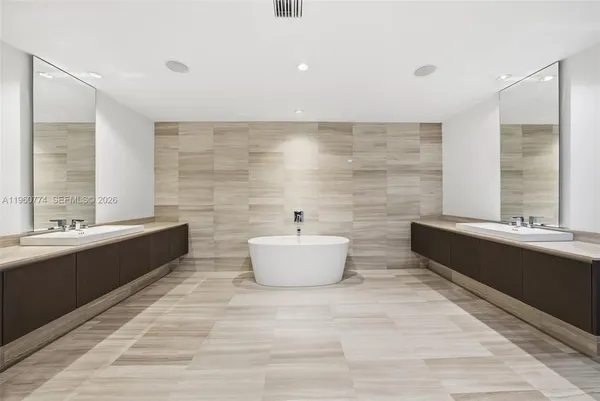 a view of empty room with stairs