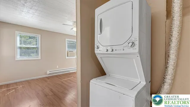 a utility room with dryer and washer