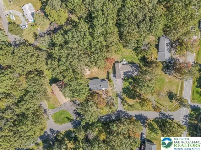 a view of a yard with an outdoor space