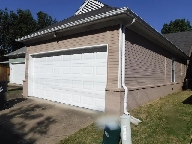 a side view of a house with a small space