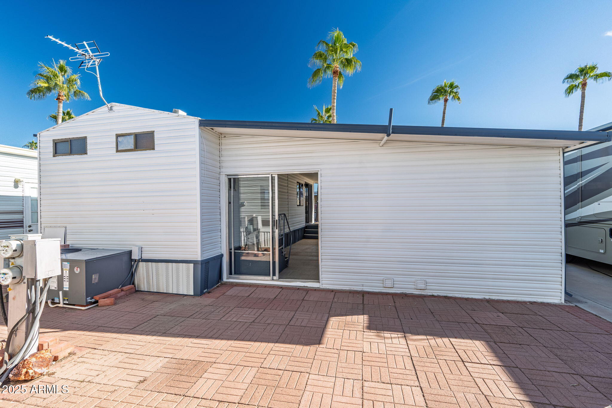 977 South Oxide Drive, Unit 977 Apache Junction, AZ 85119 - Photo 15 of 15 a view of a entryway front of house