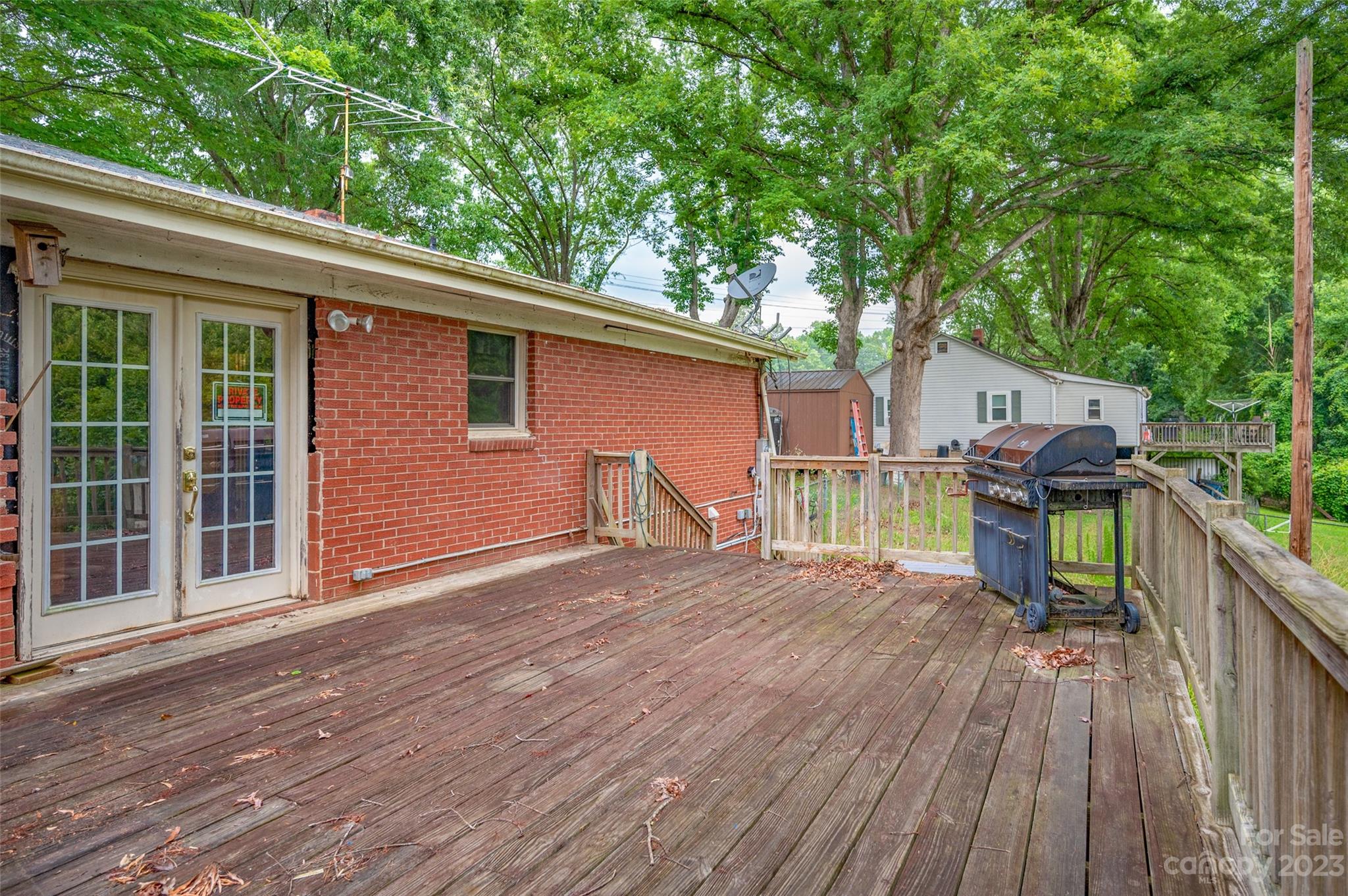 895 Perth Road Troutman, NC 28166 - Photo 17 of 18 a view of a backyard with a patio