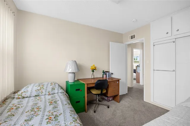 a view of a workspace with furniture