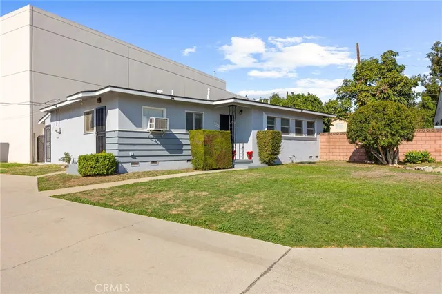 a front view of house with yard