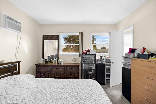 a kitchen with a stove a sink and a refrigerator