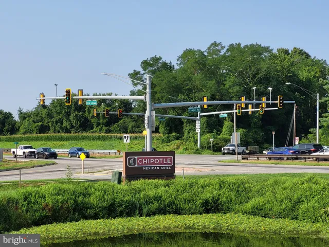 a view of a park with swings and slides