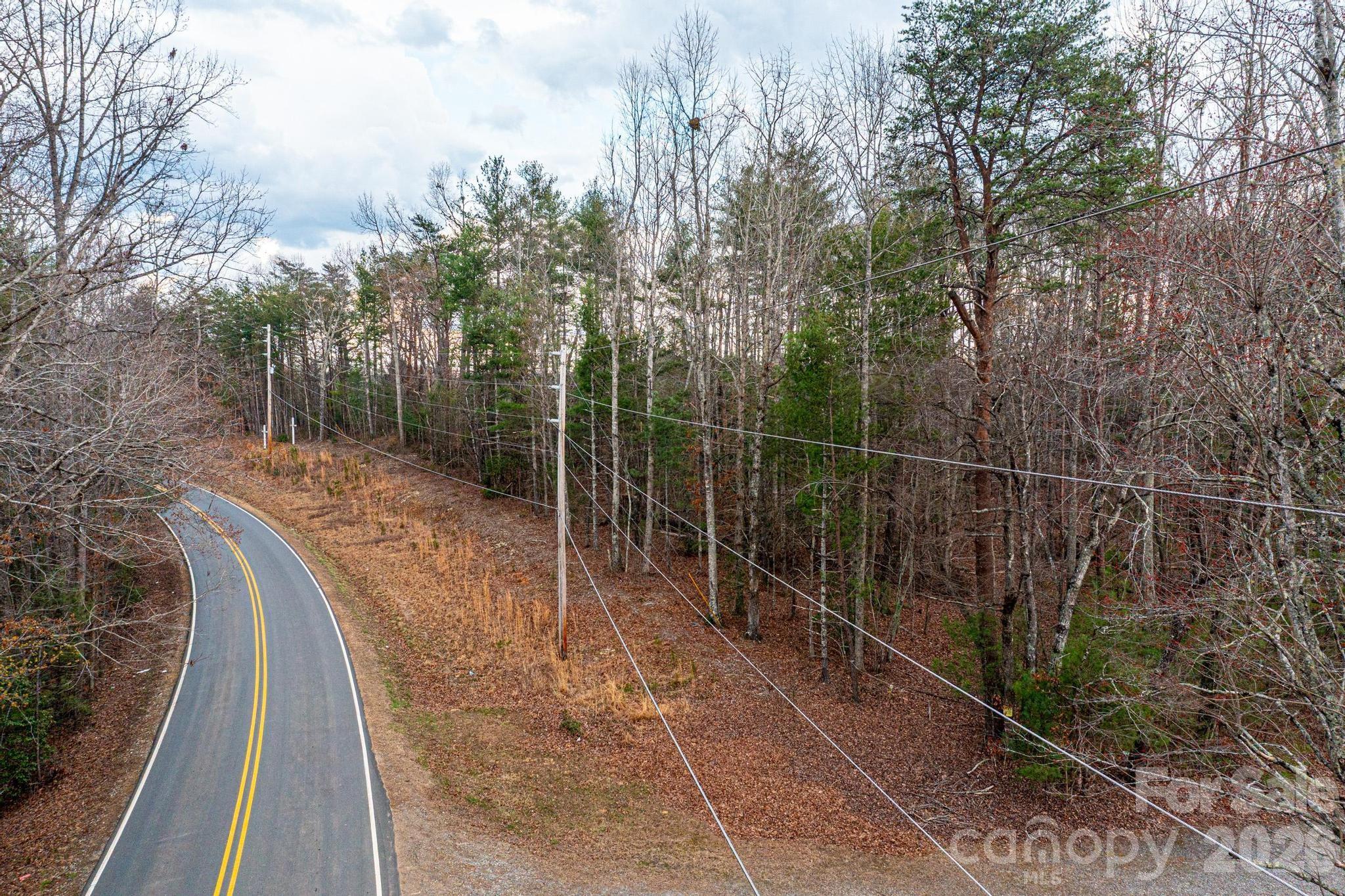 0 Playmore Beach Road Morganton, NC 28655 - Photo 3 of 12 a view of a pathway with a wrought fence