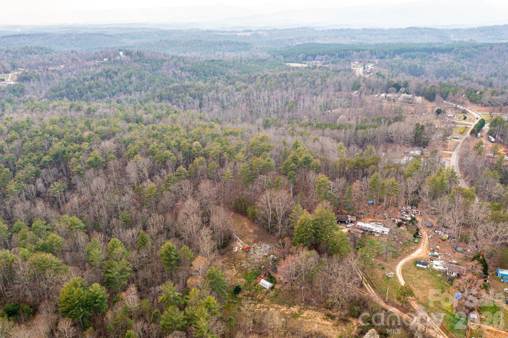 0 Playmore Beach Road Morganton, NC 28655 - Photo 8 of 12 a view of a city with lush green forest