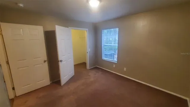 a view of hallway with closet