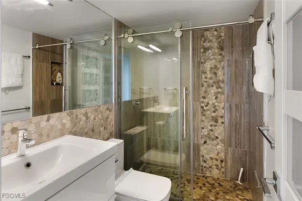 a beach with palm trees