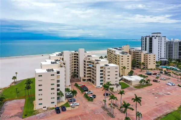 an aerial view of beach and ocean