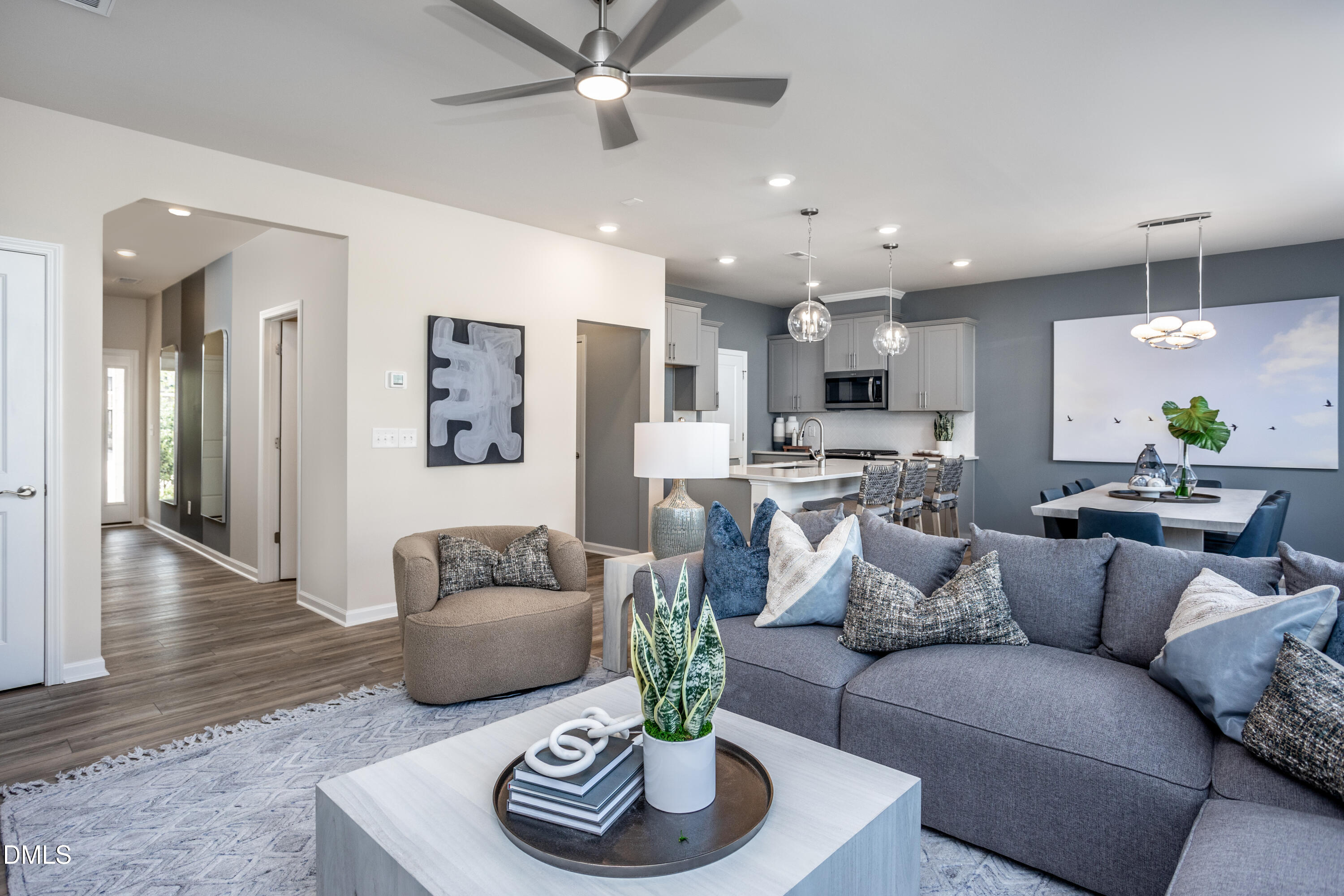1207 Jensen Road Durham, NC 27703 - Photo 7 of 31 a living room with furniture and a wooden floor