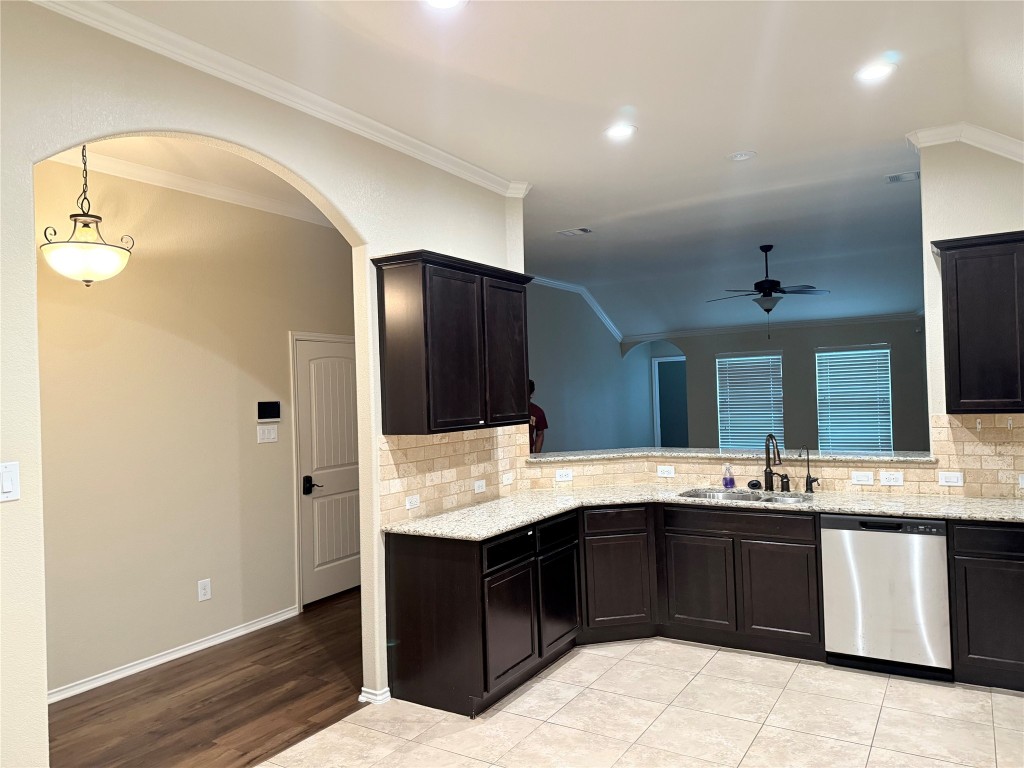 1704 Tranquility Lane Pflugerville, TX 78660 - Photo 16 of 19 a bathroom with a sink and a mirror