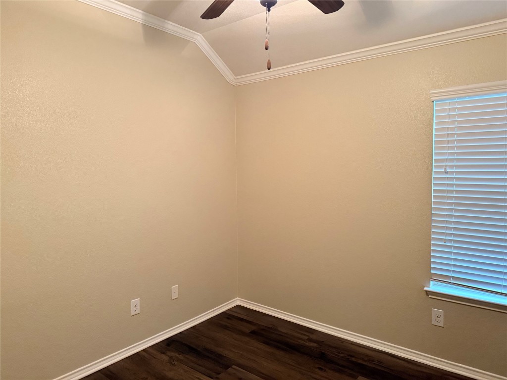 1704 Tranquility Lane Pflugerville, TX 78660 - Photo 3 of 19 a view of a small space with wooden floor and fan