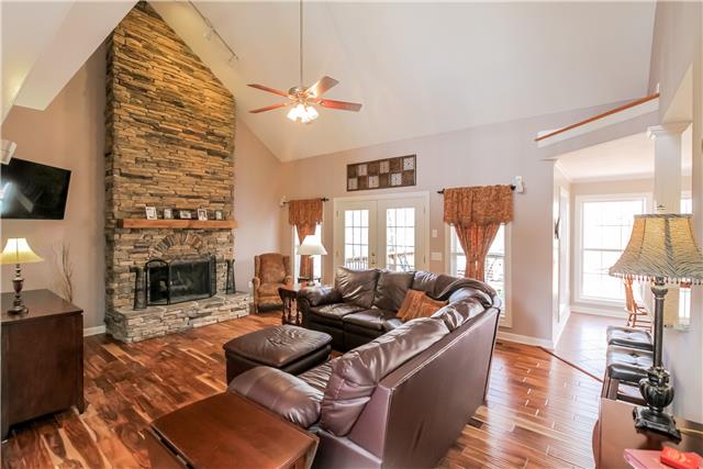 1012 Mohawk Trail Springfield, TN 37172 - Photo 4 of 20 Stone fireplace towering to ceiling!
