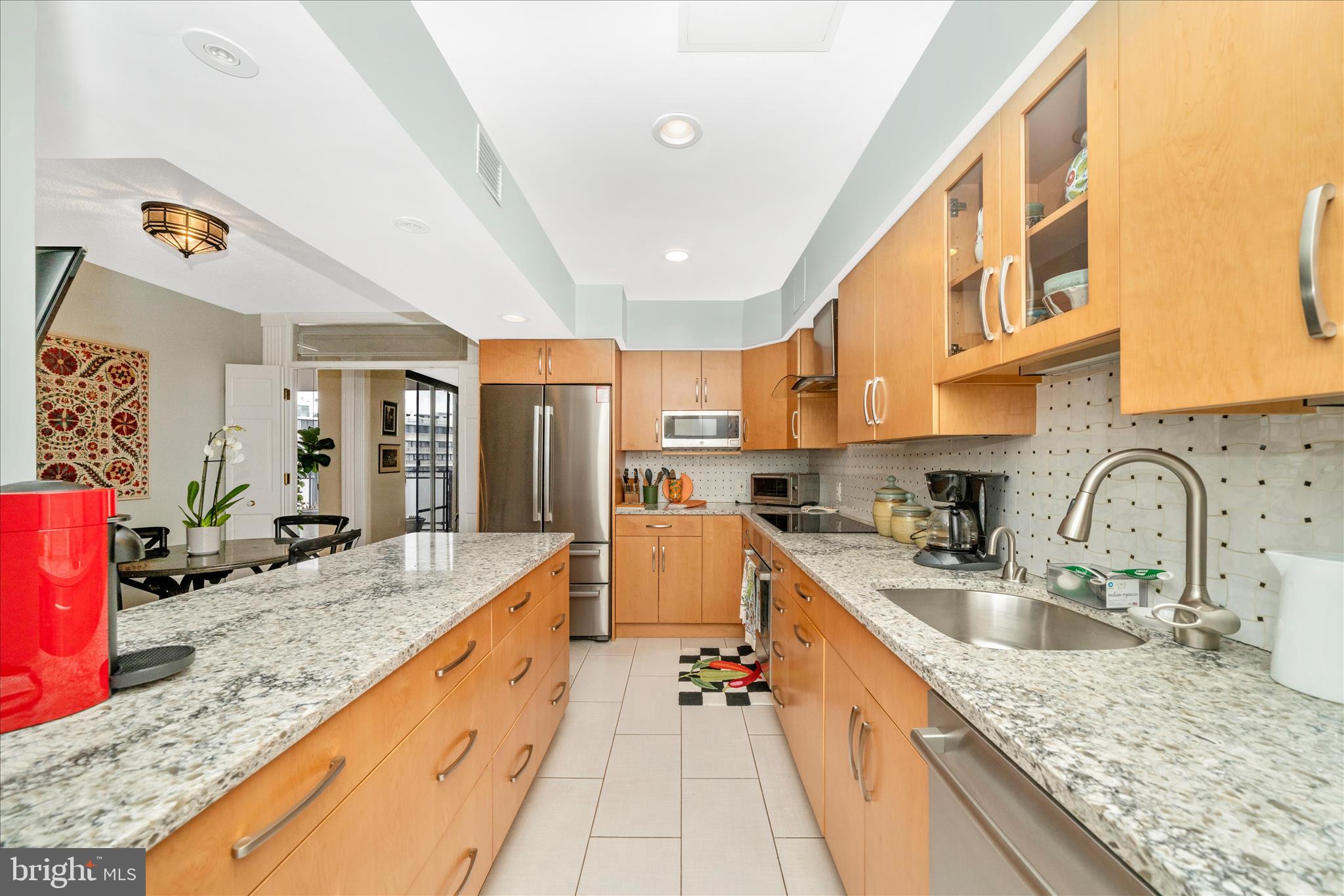 800 25th Street Northwest, Unit 1003 Washington, DC 20037 - Photo 13 of 28 Updated Kitchen with quartz counter.