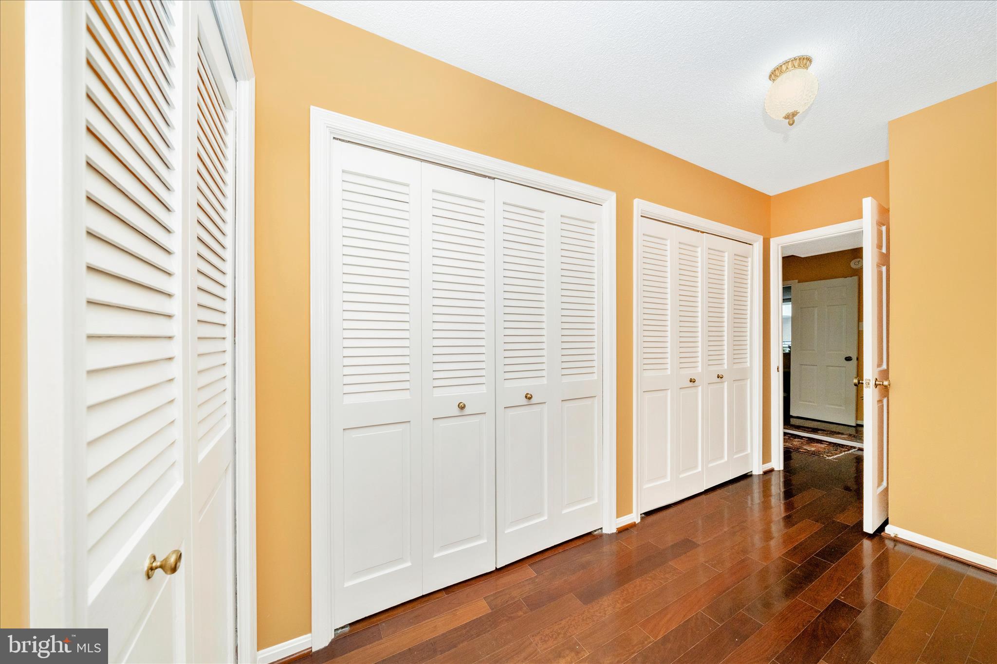 800 25th Street Northwest, Unit 1003 Washington, DC 20037 - Photo 22 of 28 Views of closets leading to primary bedroom.