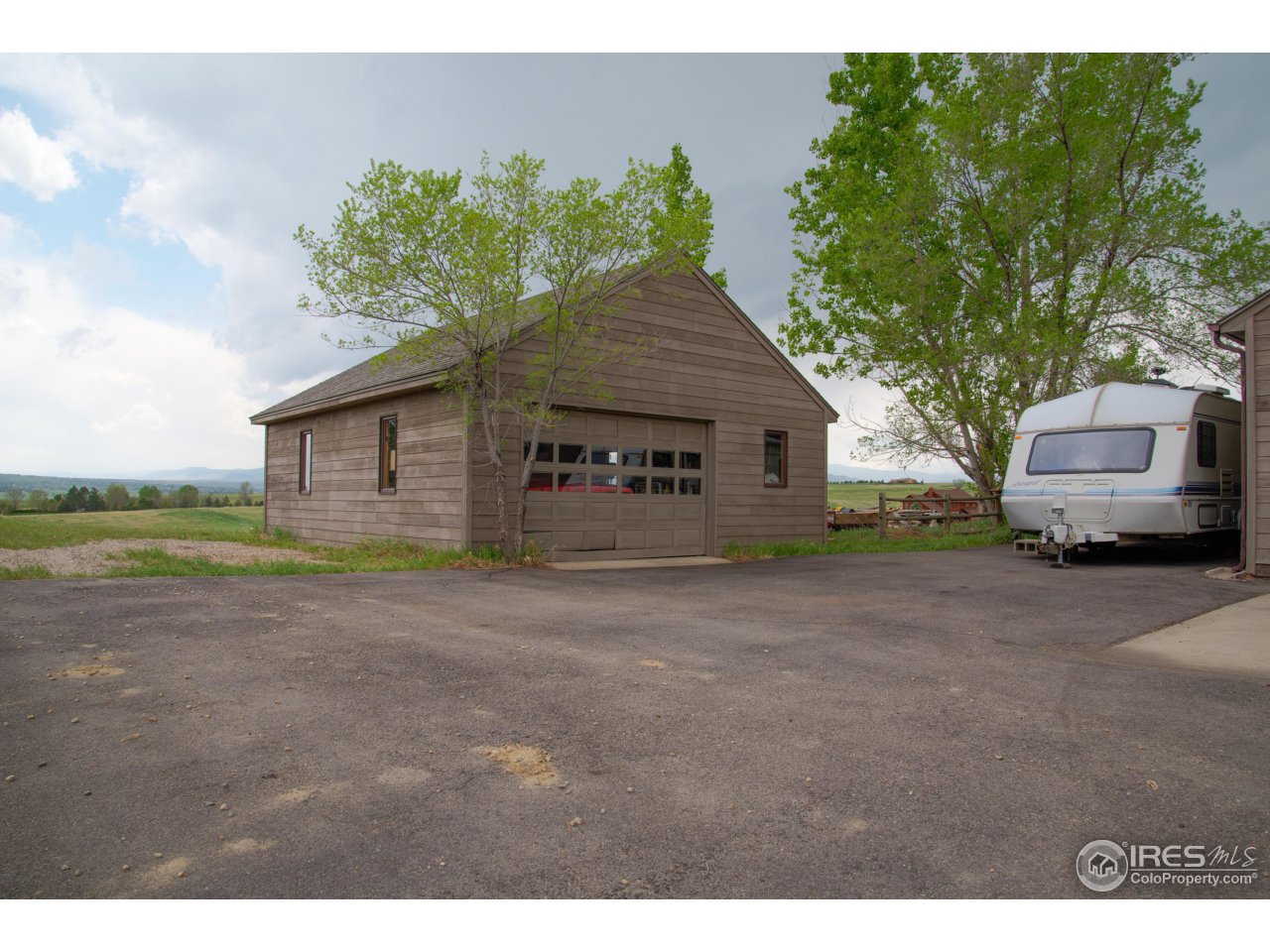 9354 Gunbarrel Ridge Road Boulder, CO 80301 - Photo 4 of 23 a view of a house with backyard and garden