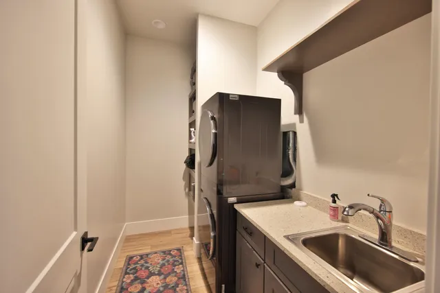 a bathroom with a sink and mirror