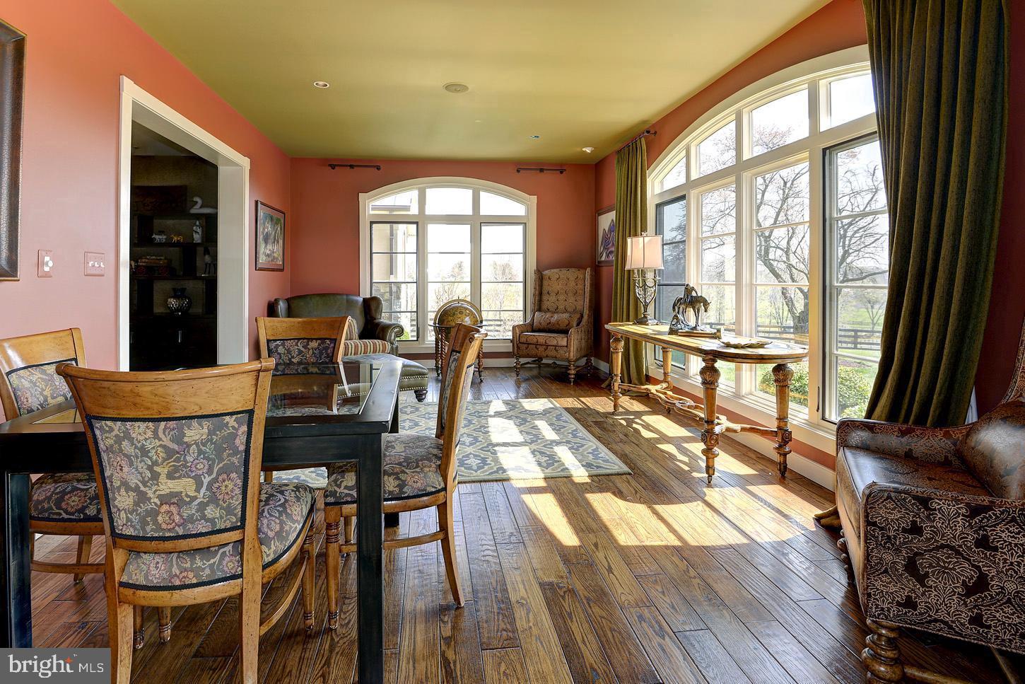 16704 Thurston Road Dickerson, MD 20842 - Photo 20 of 101 a view of a dining room with furniture window and wooden floor