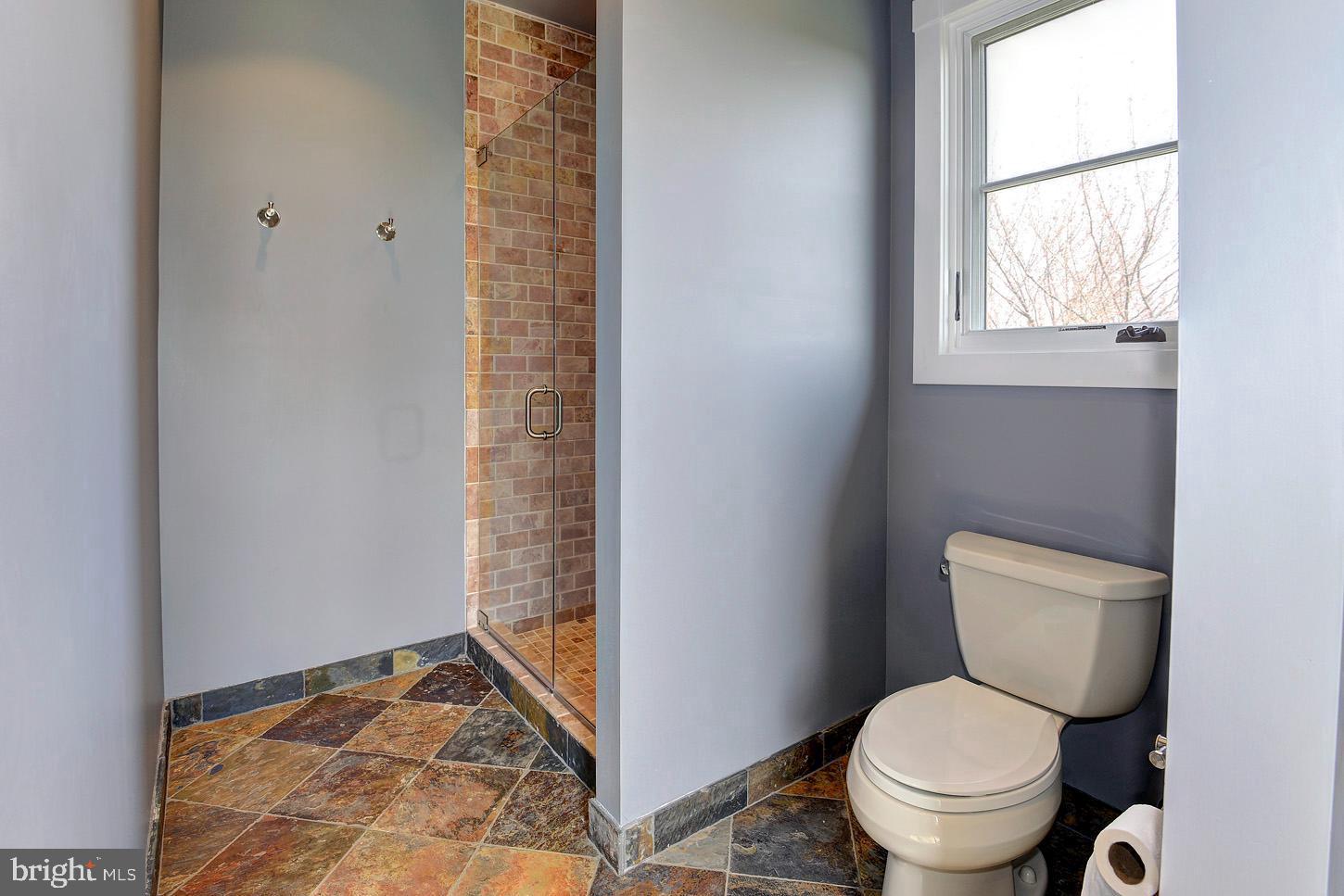 16704 Thurston Road Dickerson, MD 20842 - Photo 24 of 101 a bathroom with a toilet and a shower