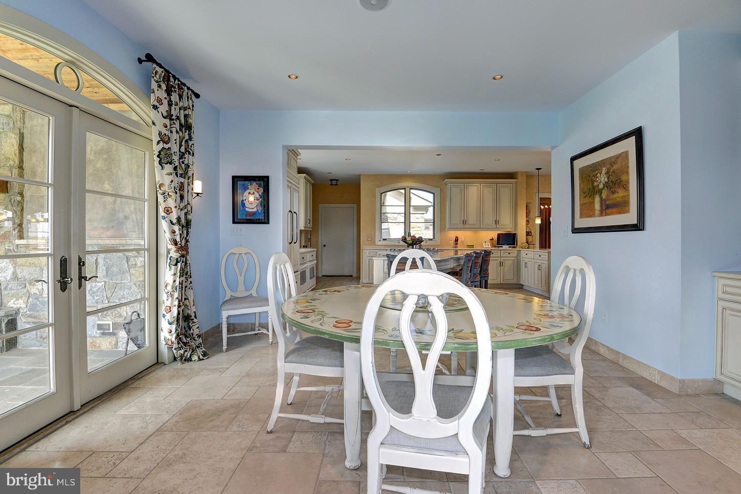 16704 Thurston Road Dickerson, MD 20842 - Photo 39 of 101 a view of a dining room with furniture and chandelier