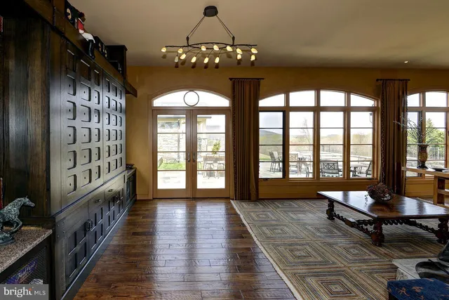 a view of a dinning table and chairs in the patio