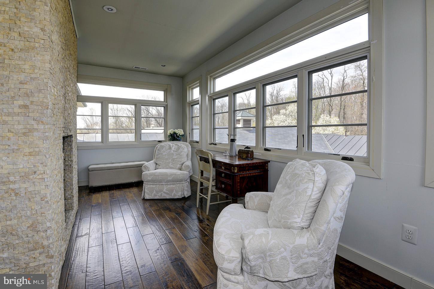 16704 Thurston Road Dickerson, MD 20842 - Photo 53 of 101 a living room with furniture and a large window