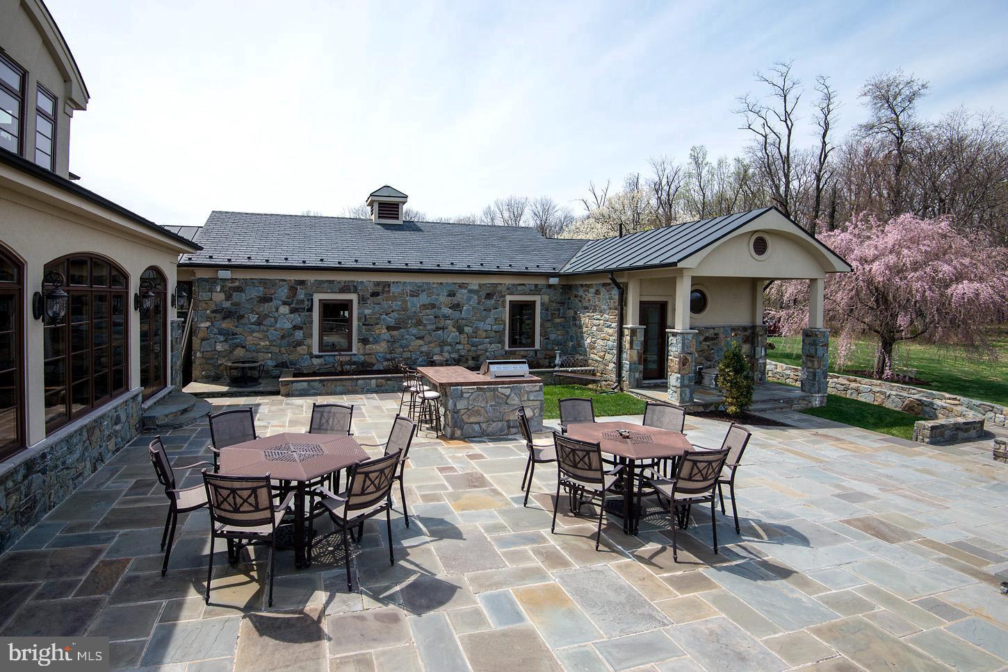 16704 Thurston Road Dickerson, MD 20842 - Photo 75 of 101 a view of a dinning table and chairs in the patio