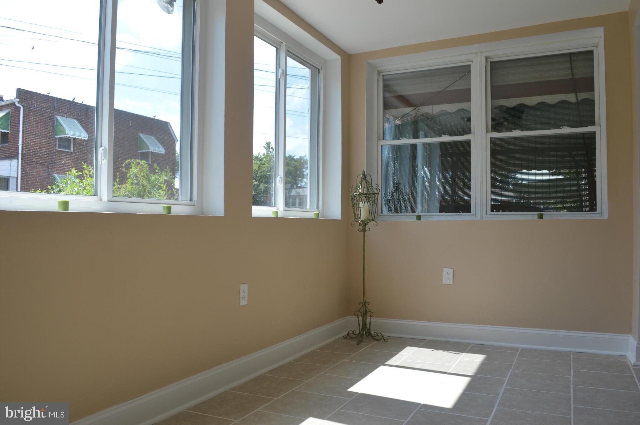 235 West Edgevale Road Baltimore, MD 21225 - Photo 13 of 30 Sun Room