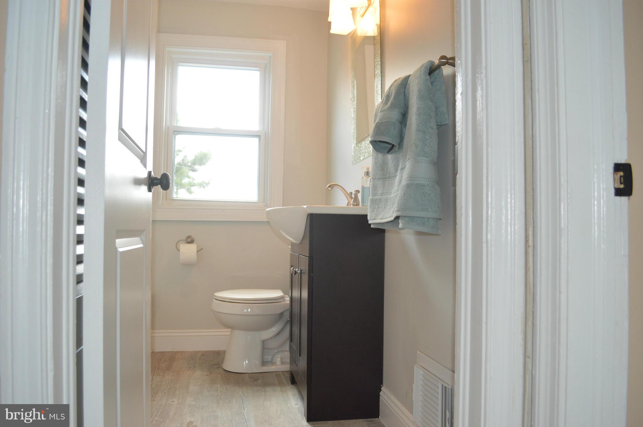 235 West Edgevale Road Baltimore, MD 21225 - Photo 21 of 30 Upper Level Bathroom