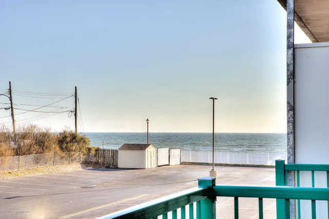 a view of a ocean from a balcony