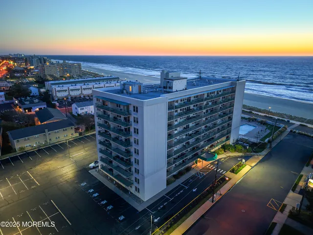 a view of a balcony with wooden floor