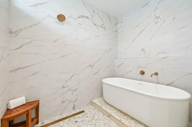 a bathroom with a sink and mirror