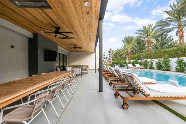 a outdoor dining space with furniture