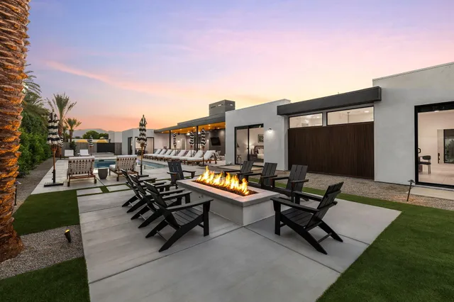 a view of a swimming pool with a lounge chair