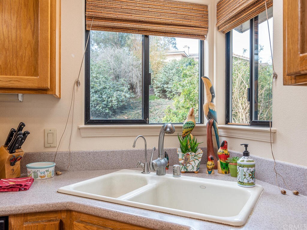 2715 Thoroughbred Place Arroyo Grande, CA 93420 - Photo 12 of 35 a bathroom with a sink and a window