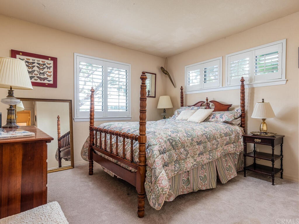 2715 Thoroughbred Place Arroyo Grande, CA 93420 - Photo 18 of 35 a bedroom with a bed and a window